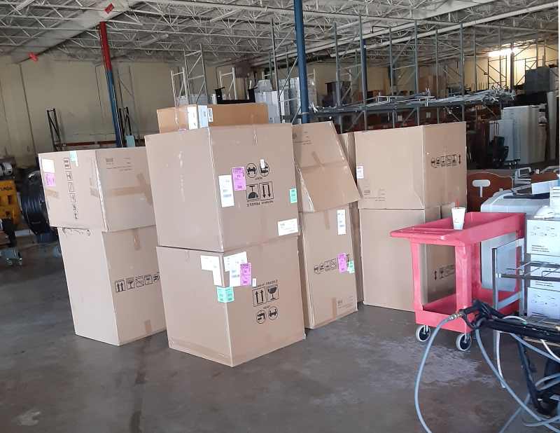 an image of boxes printers kepted in room